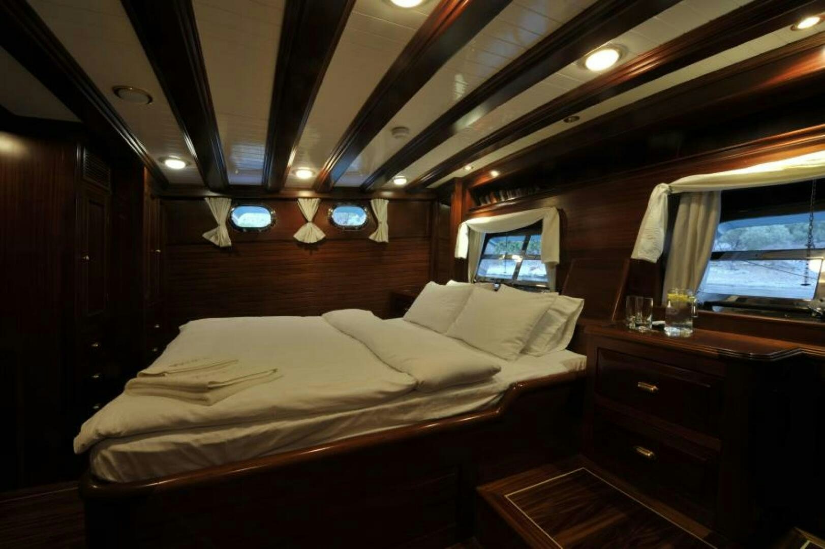 a bed in a room aboard CLARISSA Yacht for Sale