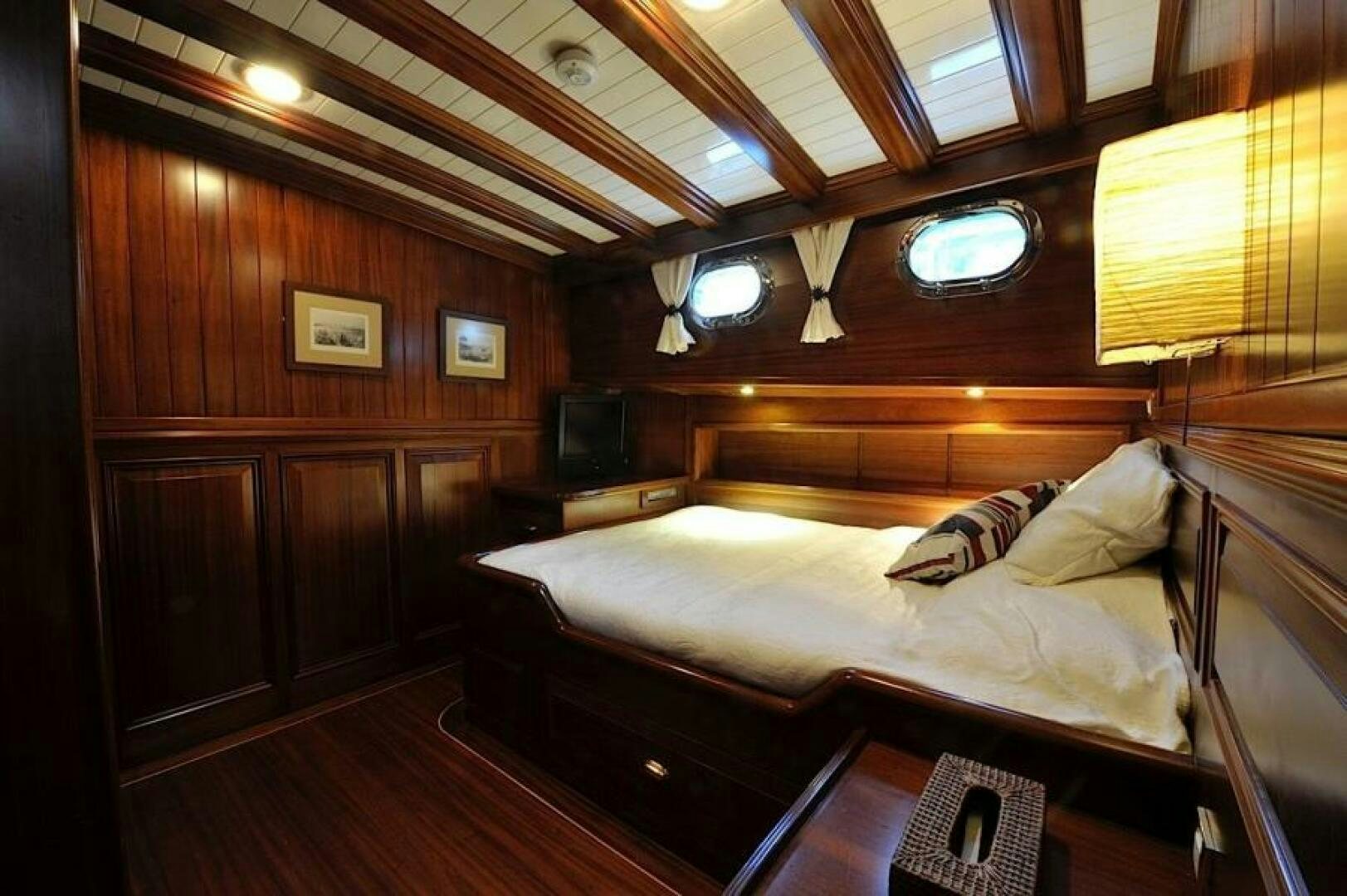 a bed in a room aboard CLARISSA Yacht for Sale