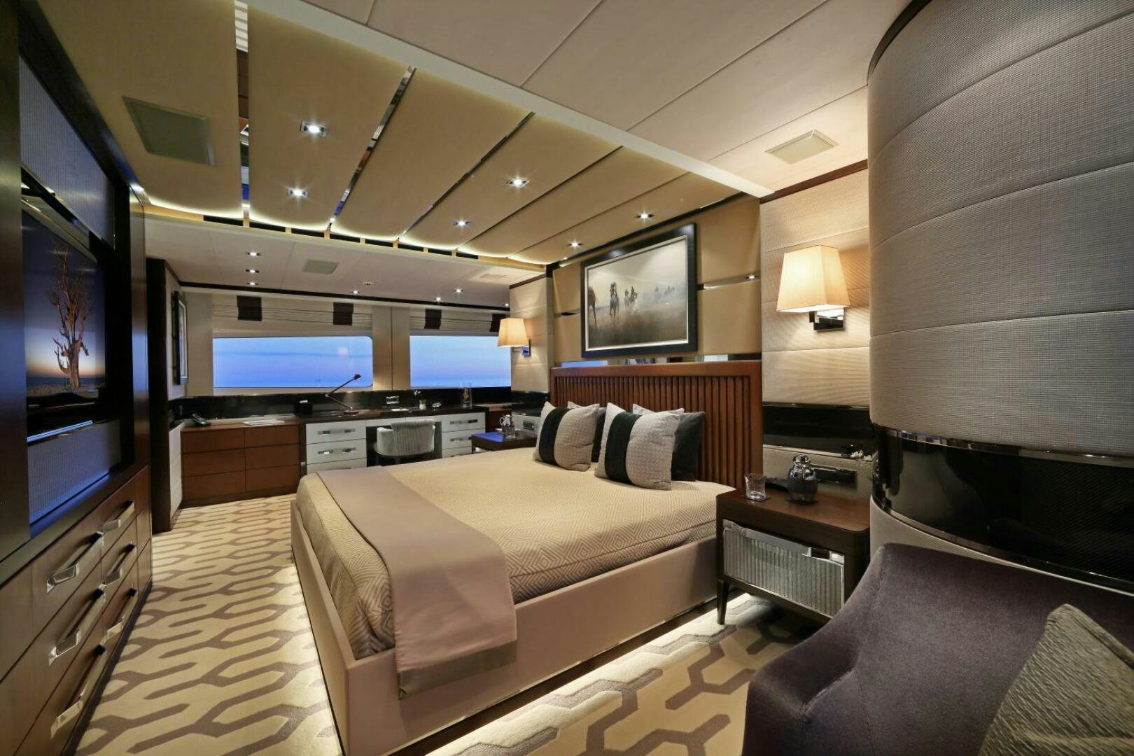 a room with a bed and a tv aboard AURELIA Yacht for Sale