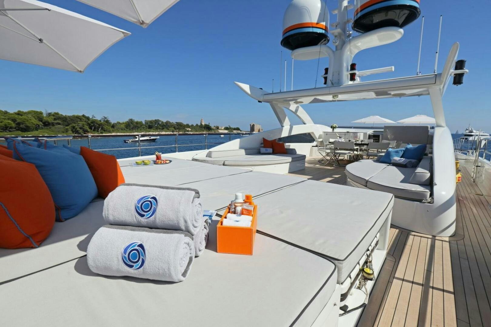 a white boat on a deck aboard AURELIA Yacht for Sale