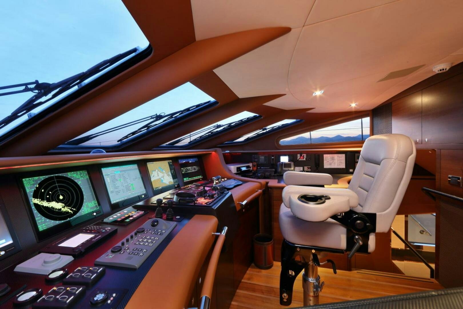 a room with many computers and monitors aboard AURELIA Yacht for Sale