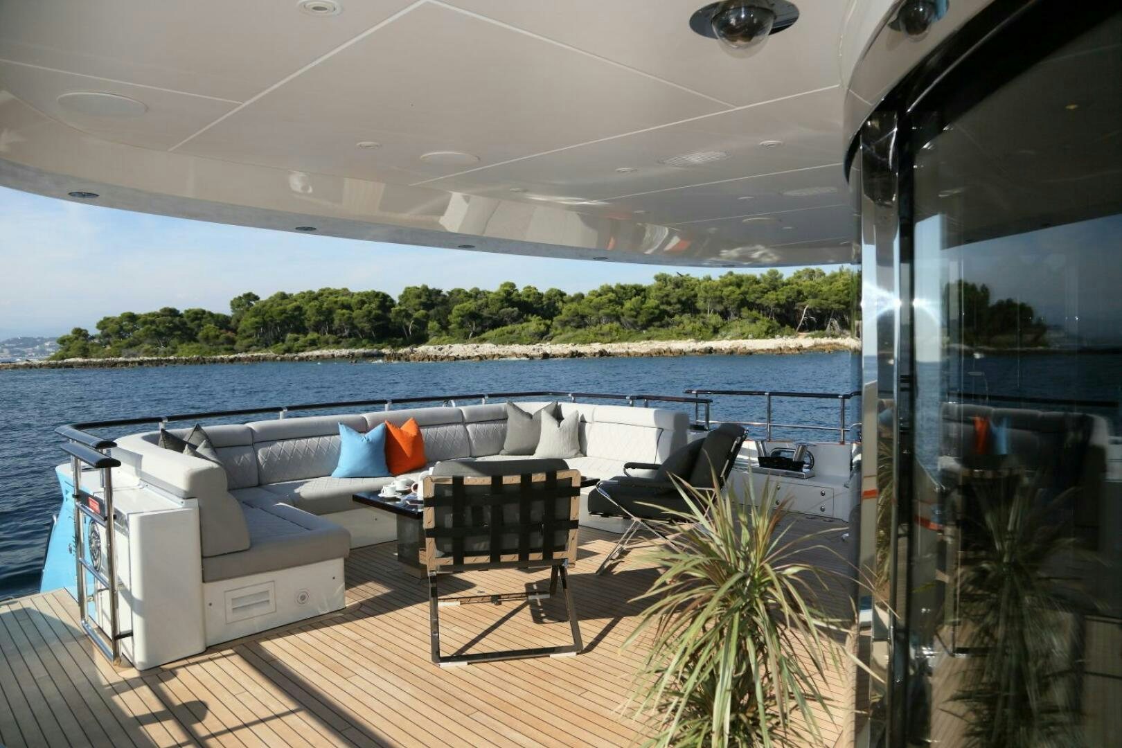 a room with a table and chairs aboard AURELIA Yacht for Sale