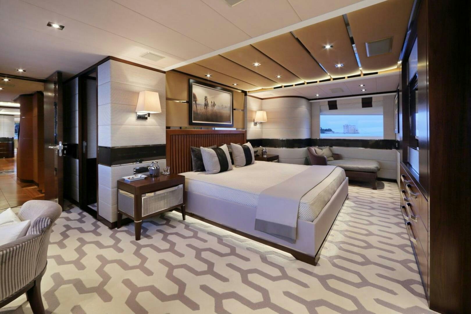 a large bedroom with a large bed aboard AURELIA Yacht for Sale