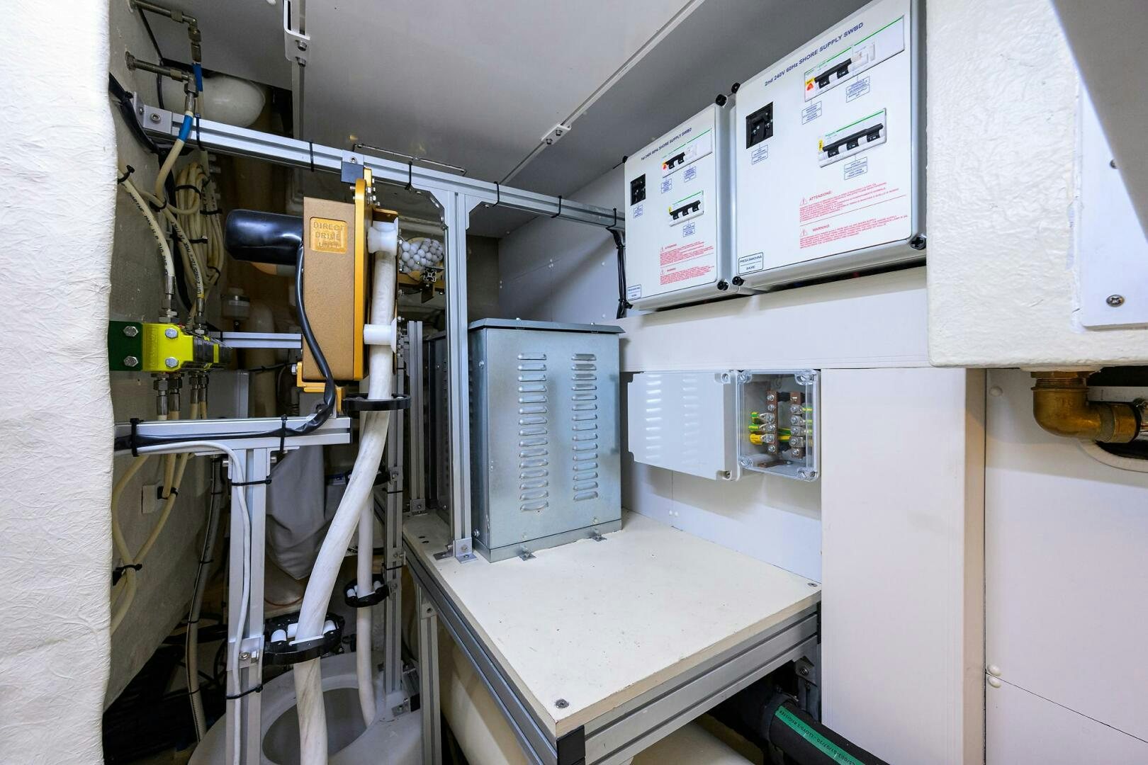 a room with several machines aboard RISE ABOVE III Yacht for Sale