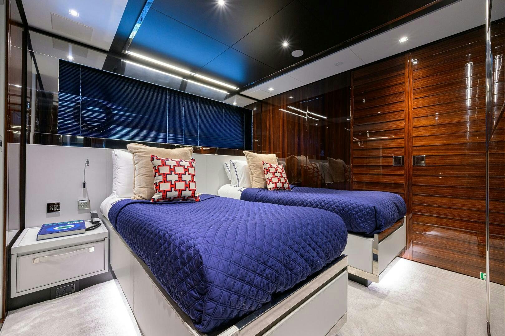 a bed in a room aboard RISE ABOVE III Yacht for Sale