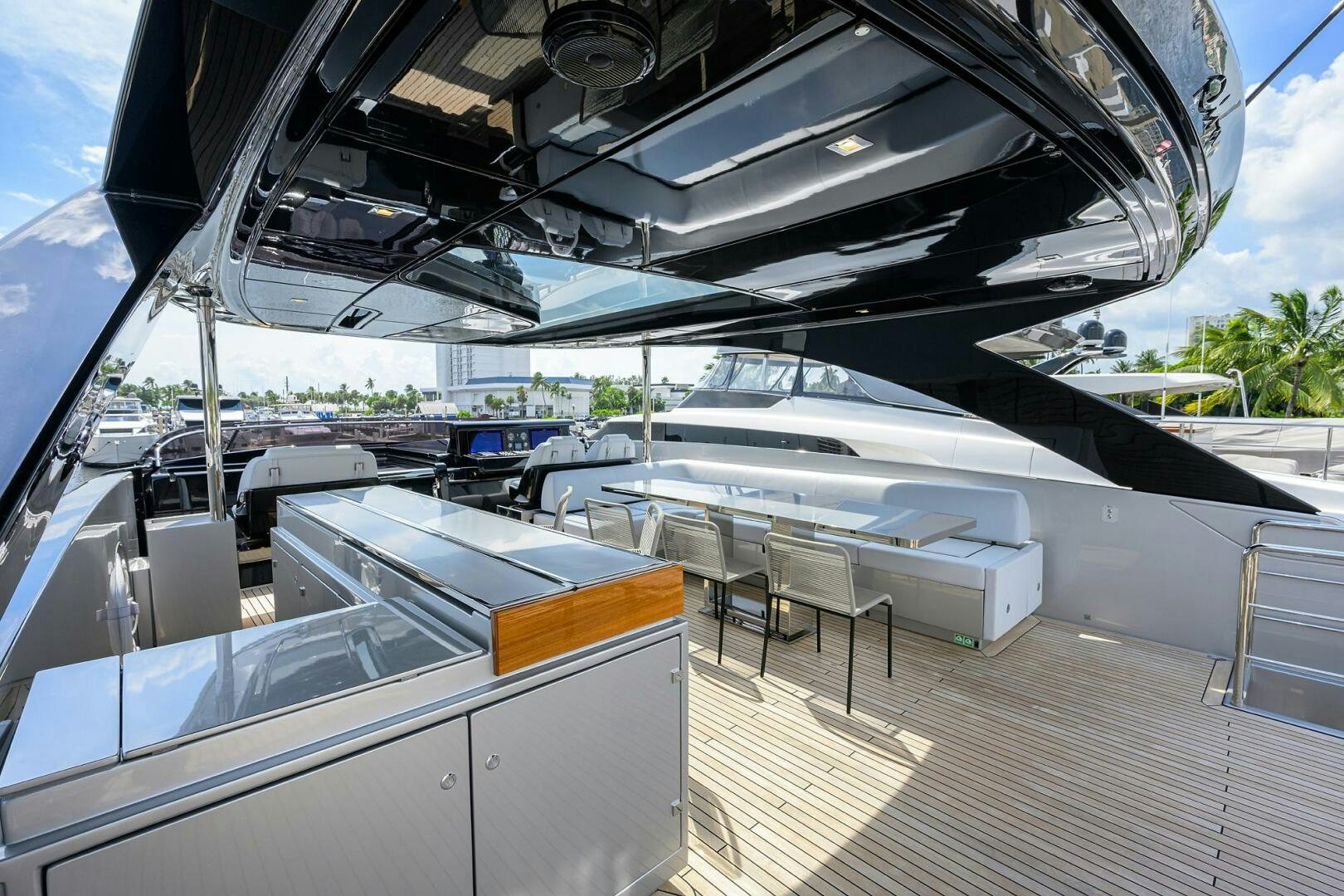 a deck with a deck and a boat on it aboard RISE ABOVE III Yacht for Sale