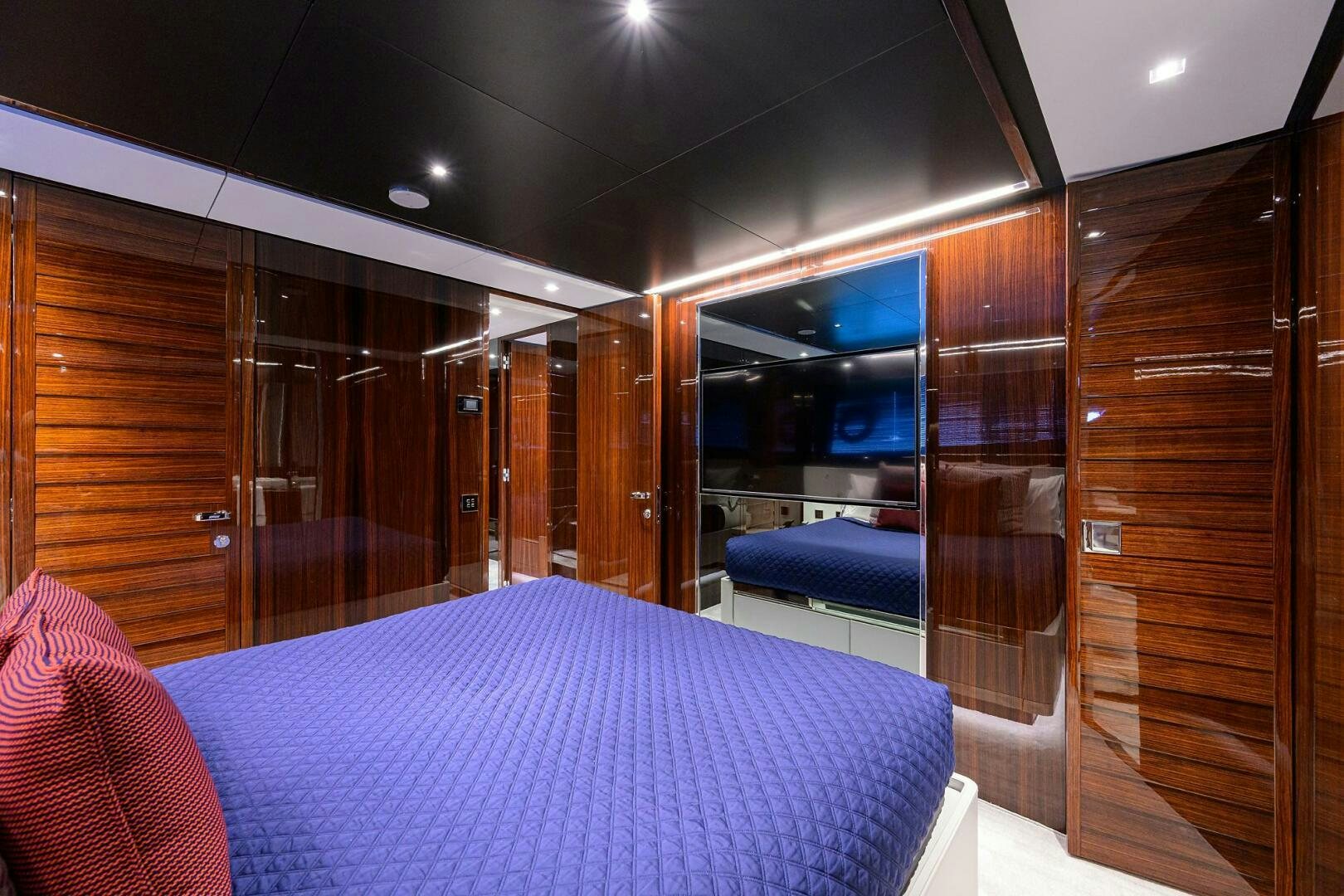 a bed in a room aboard RISE ABOVE III Yacht for Sale