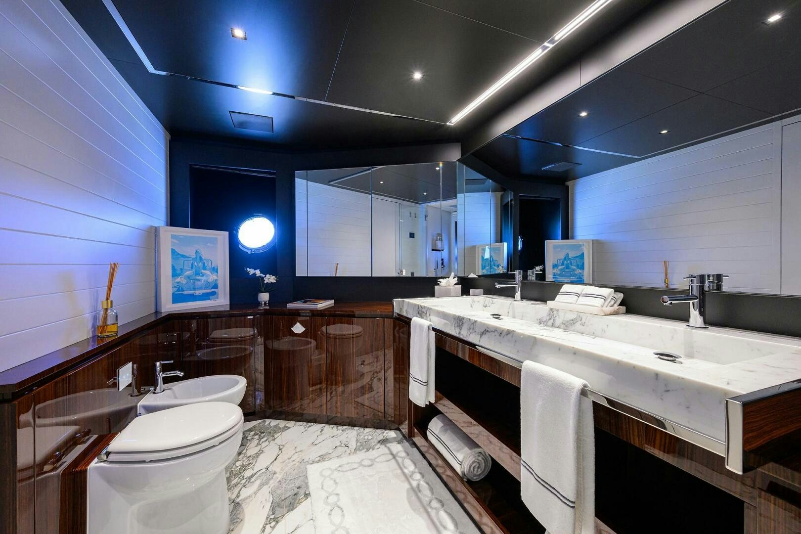 a bathroom with a large countertop aboard RISE ABOVE III Yacht for Sale