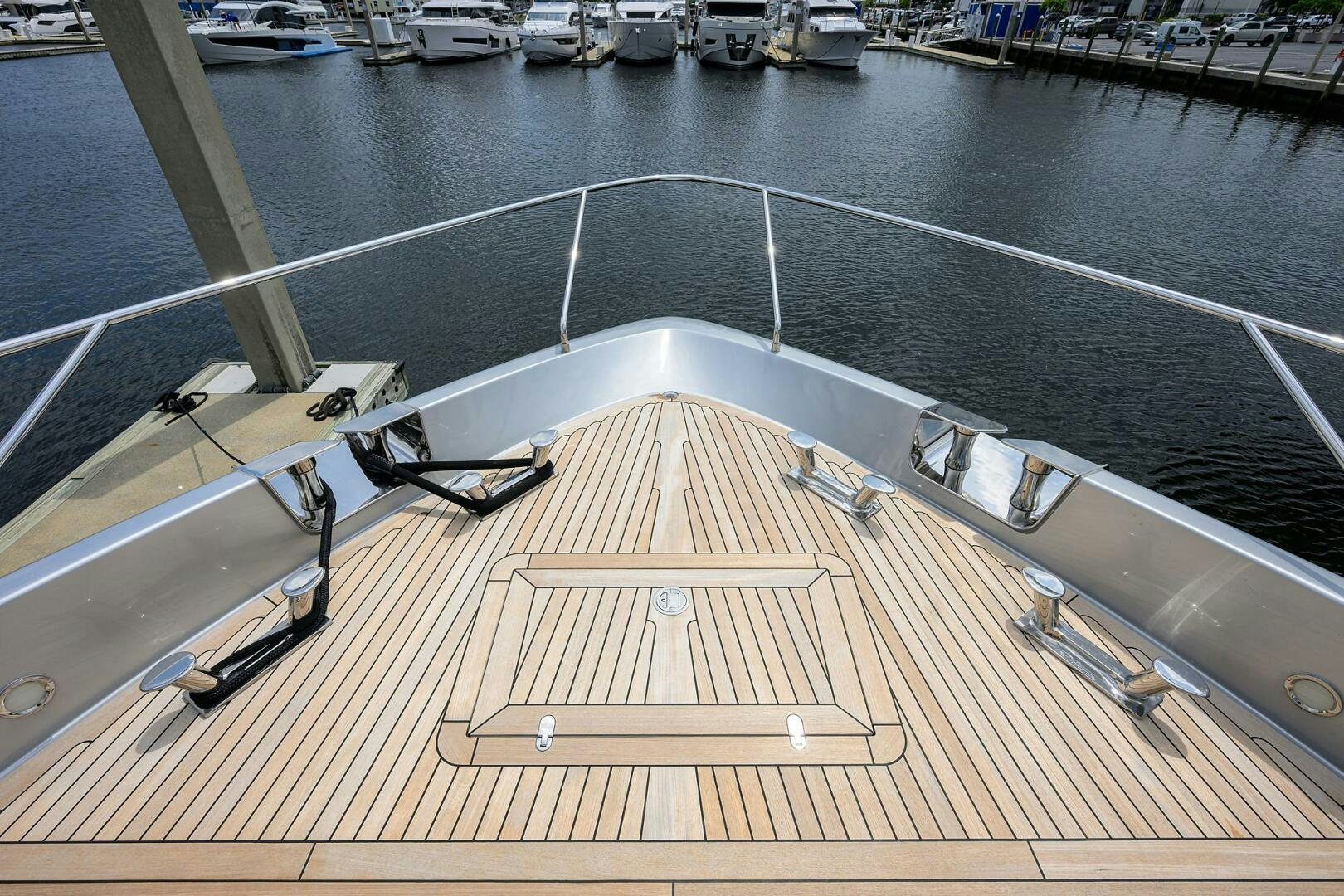 a deck with a large pool aboard RISE ABOVE III Yacht for Sale