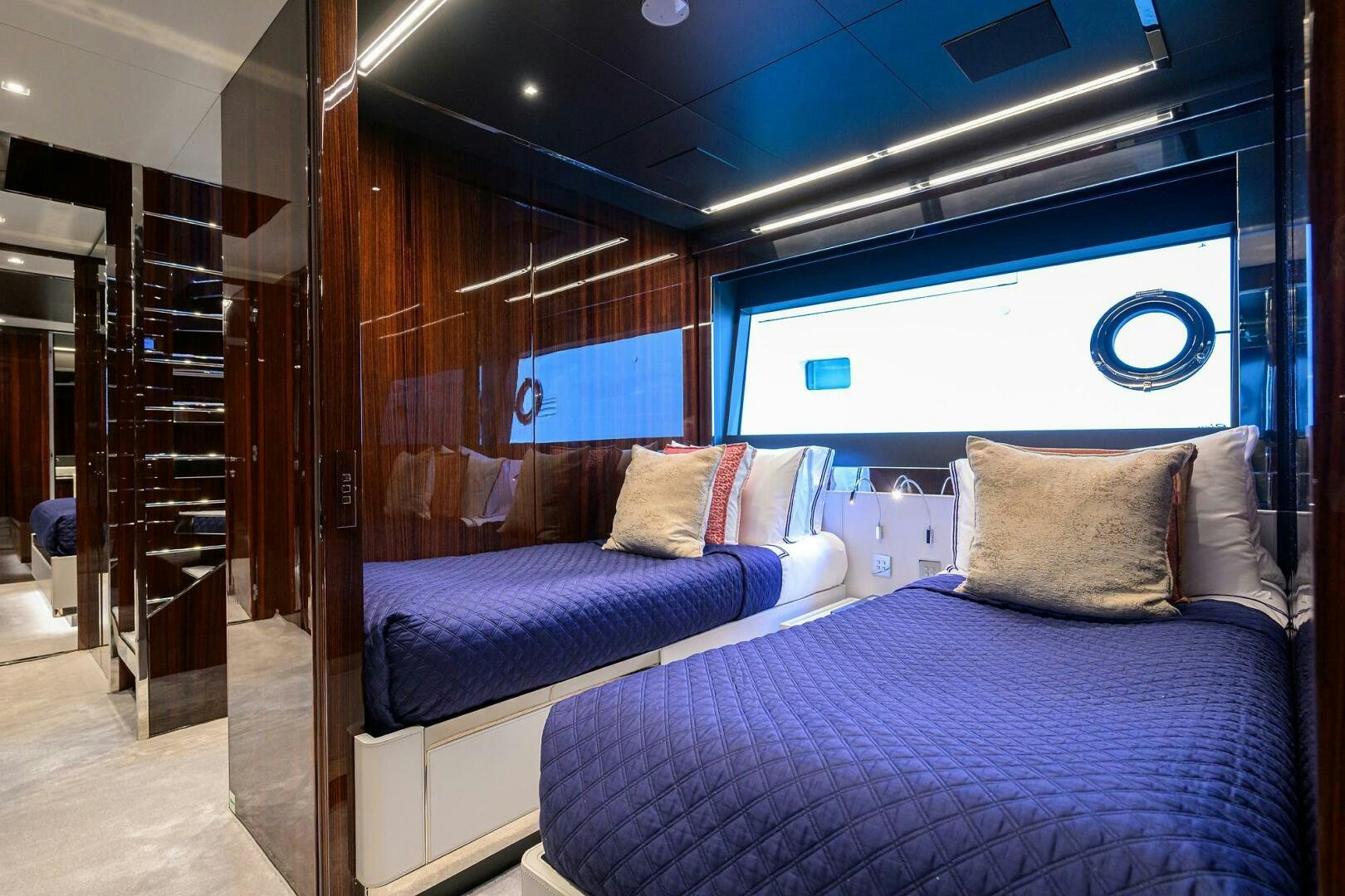a bed in a room aboard RISE ABOVE III Yacht for Sale