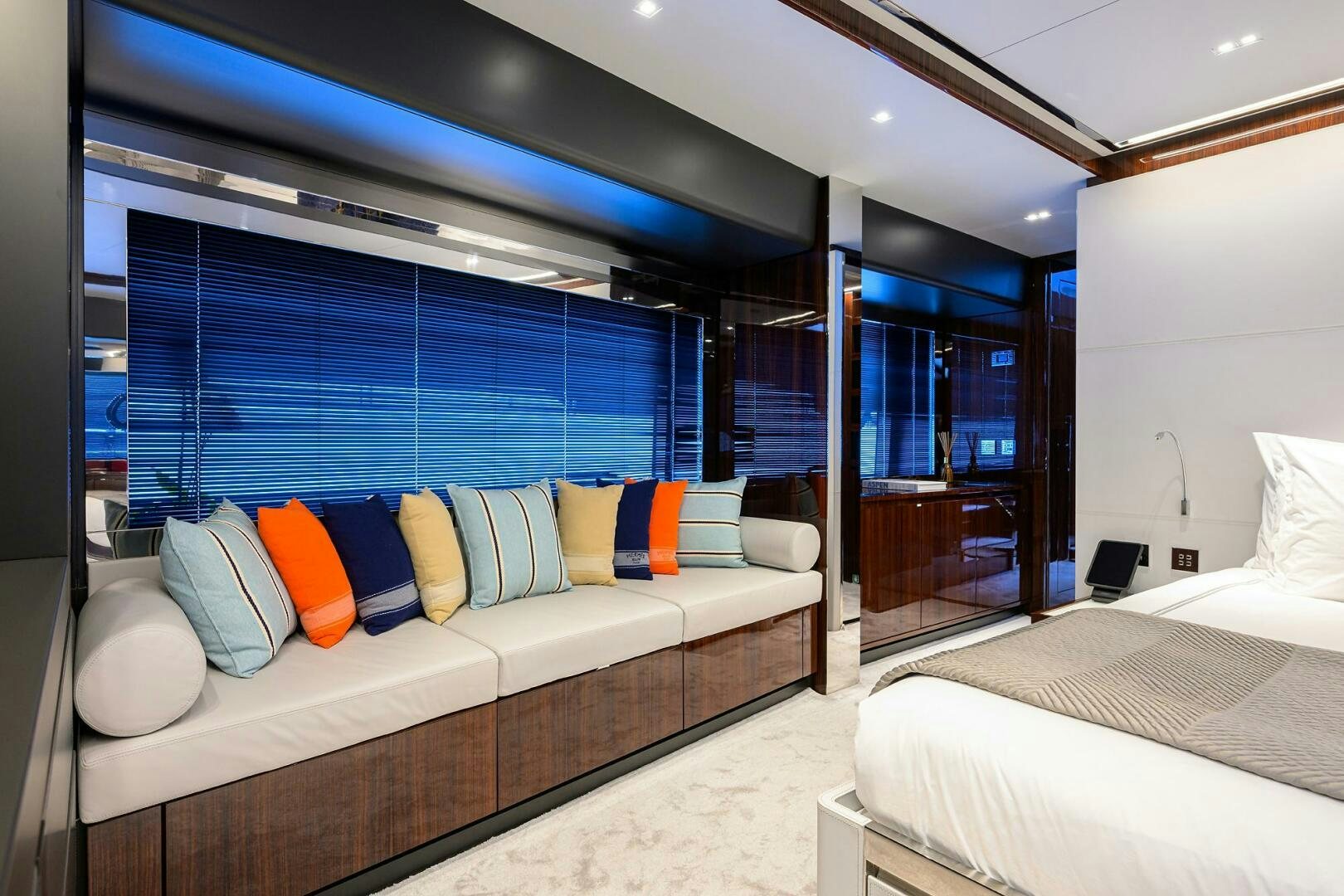 a room with a bed and a window aboard RISE ABOVE III Yacht for Sale