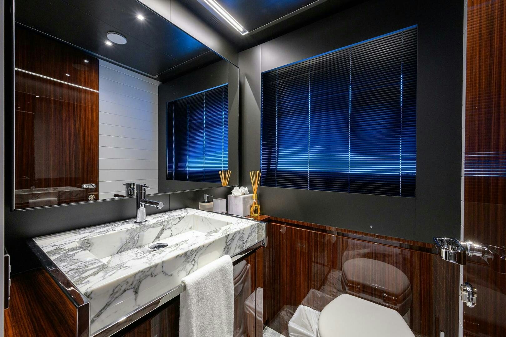 a bathroom with a large window aboard RISE ABOVE III Yacht for Sale