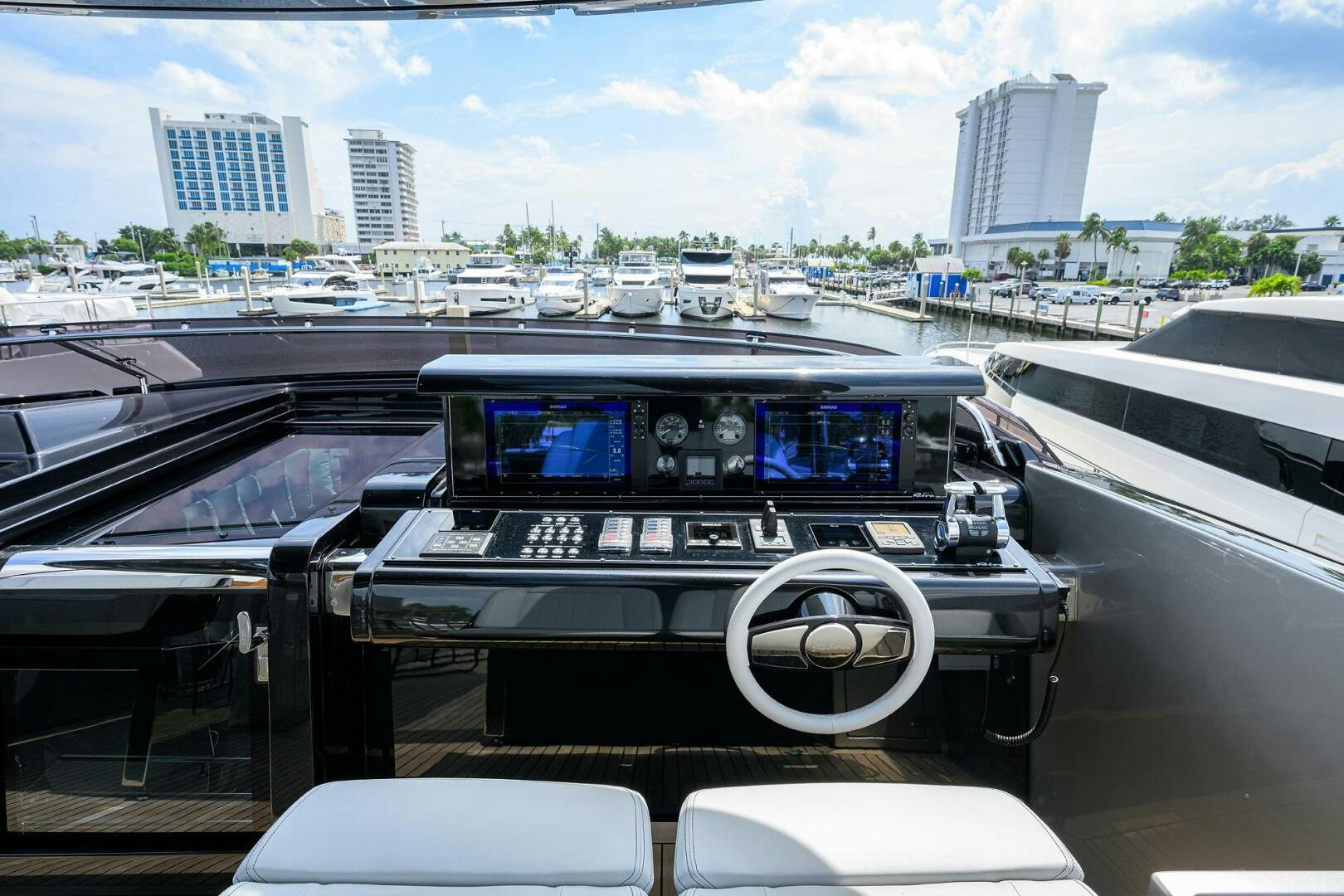a car on a road aboard RISE ABOVE III Yacht for Sale