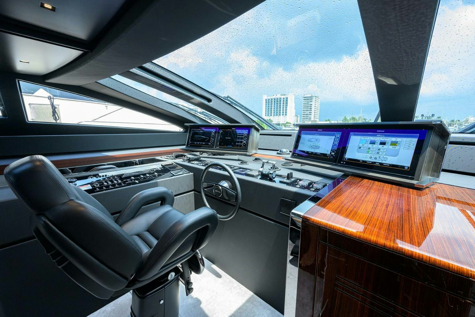 a room with computers and monitors aboard RISE ABOVE III Yacht for Sale