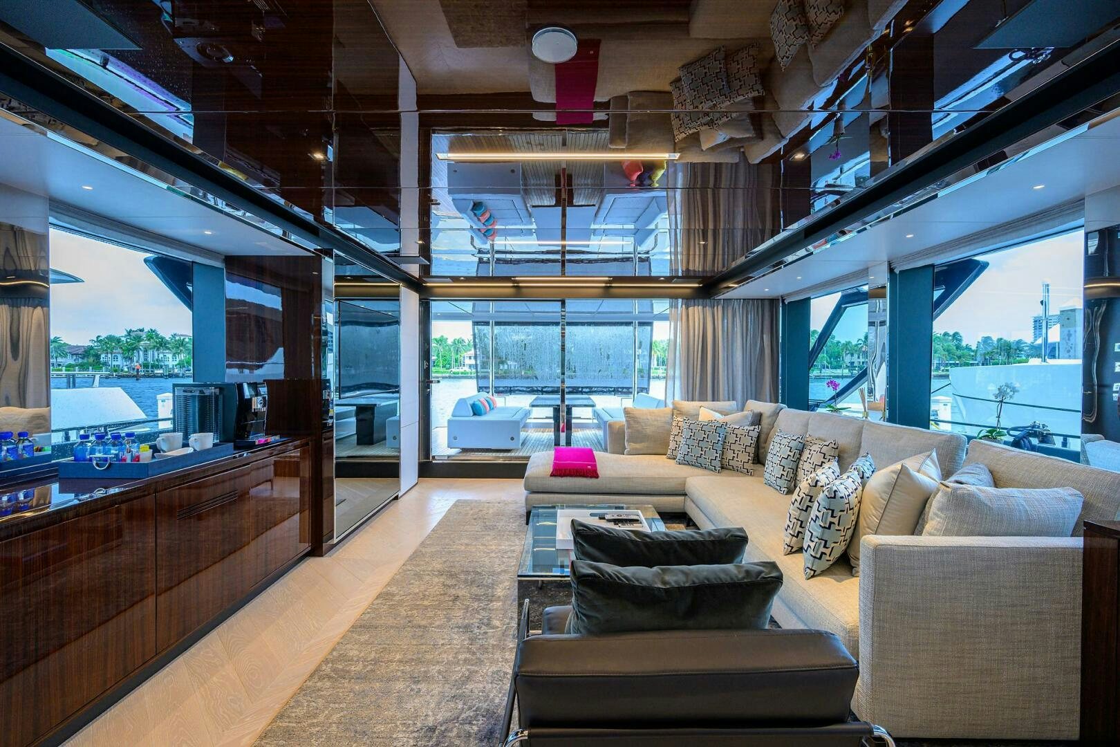 a living room with a large window aboard RISE ABOVE III Yacht for Sale