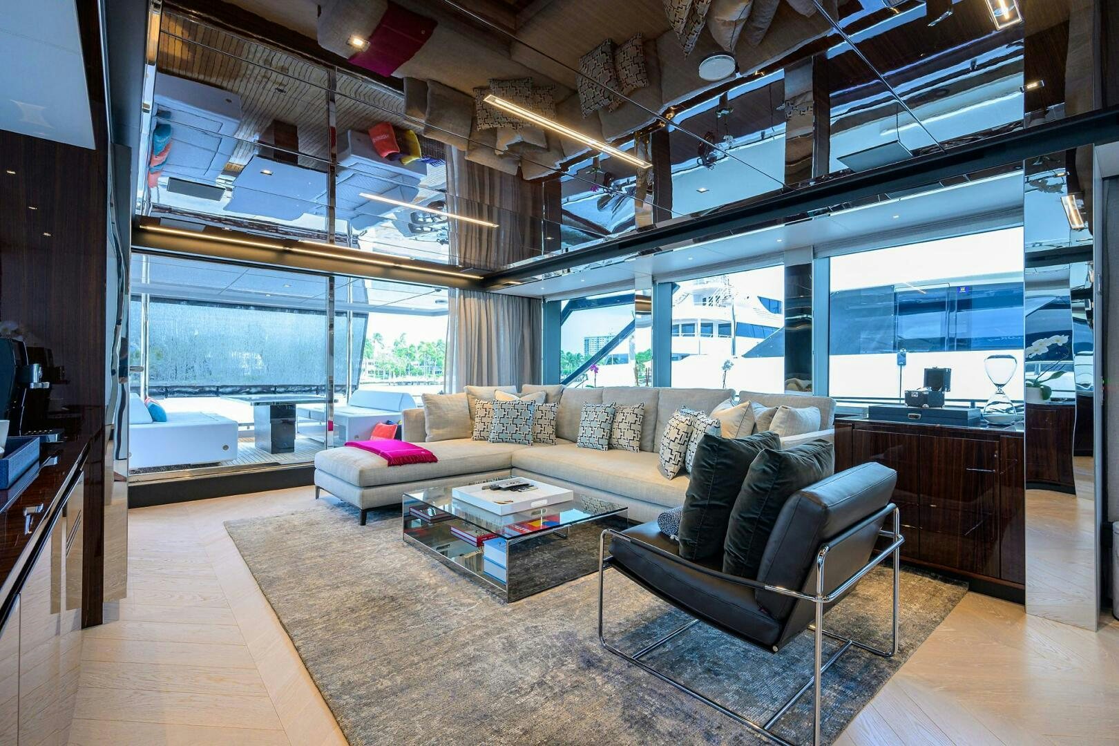 a living room with a large window aboard RISE ABOVE III Yacht for Sale