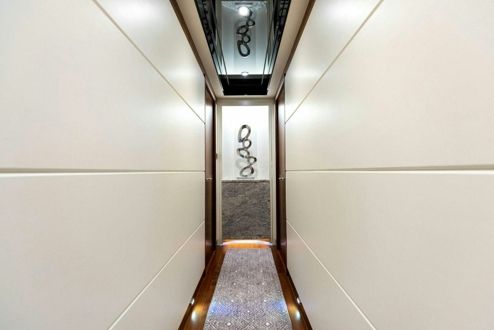 a hallway with a light aboard SUNZSET Yacht for Sale