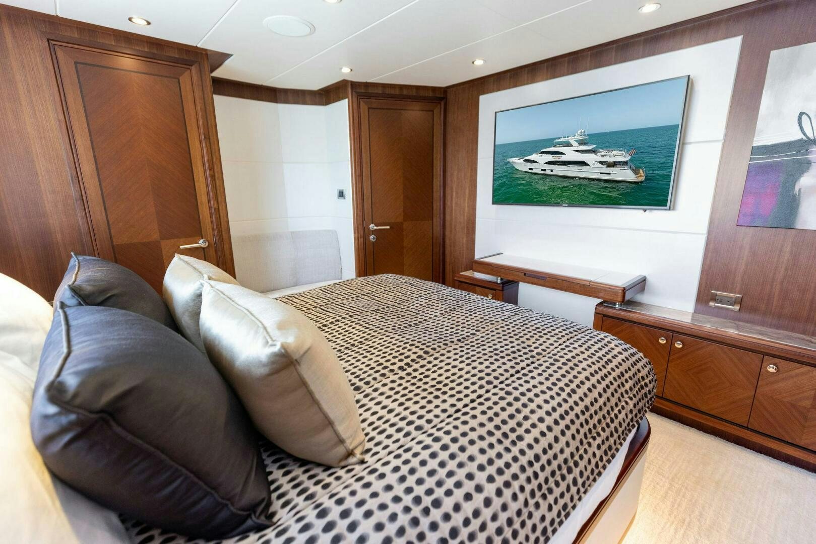 a bed in a room aboard SUNZSET Yacht for Sale