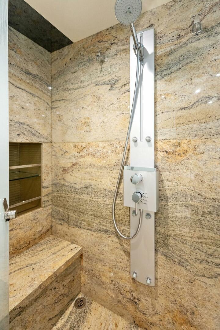 a silver metal object on a stone surface aboard SUNZSET Yacht for Sale