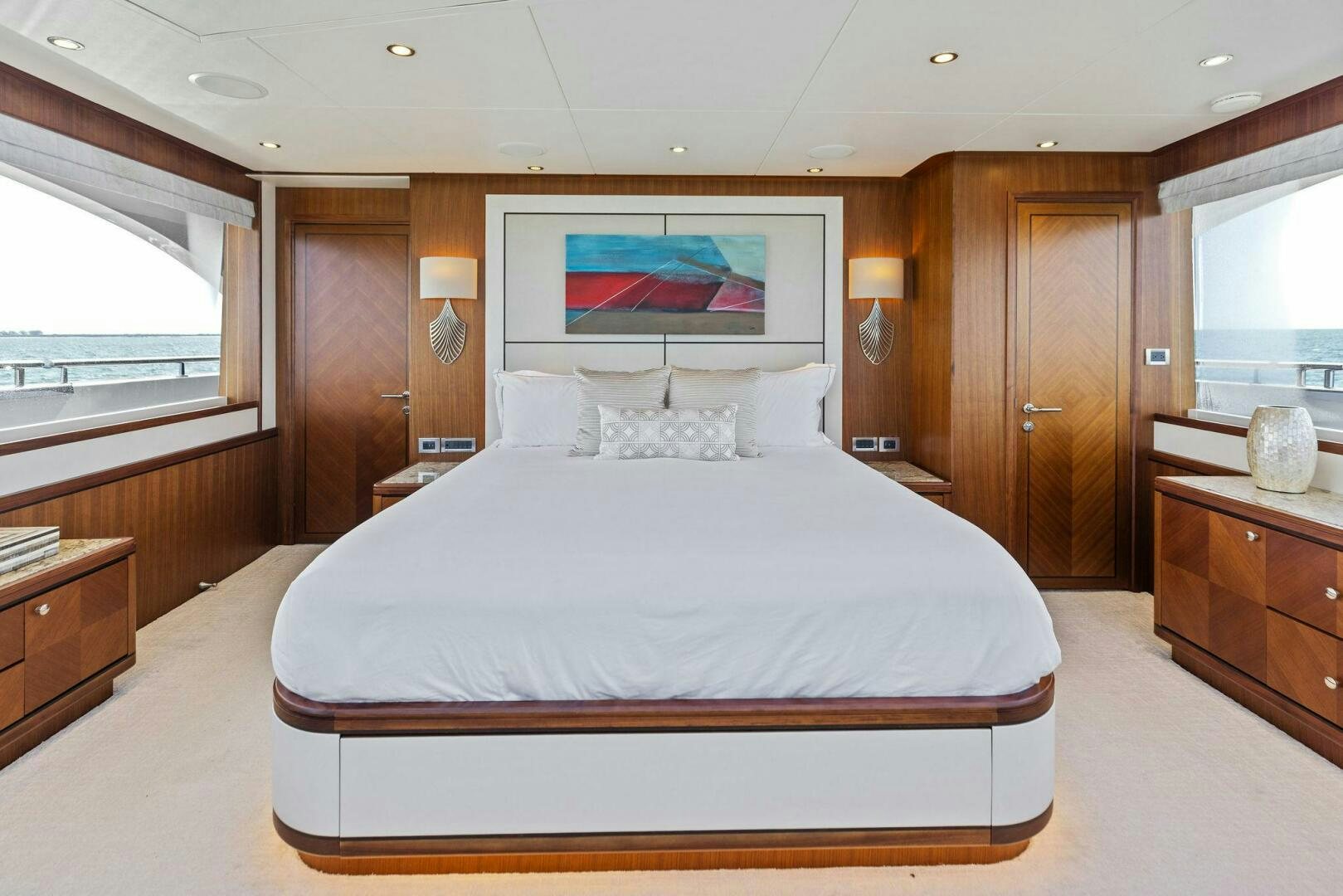 a large bed in a room aboard SUNZSET Yacht for Sale