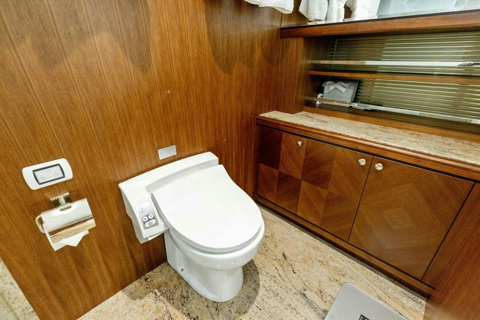 a toilet in a bathroom aboard SUNZSET Yacht for Sale