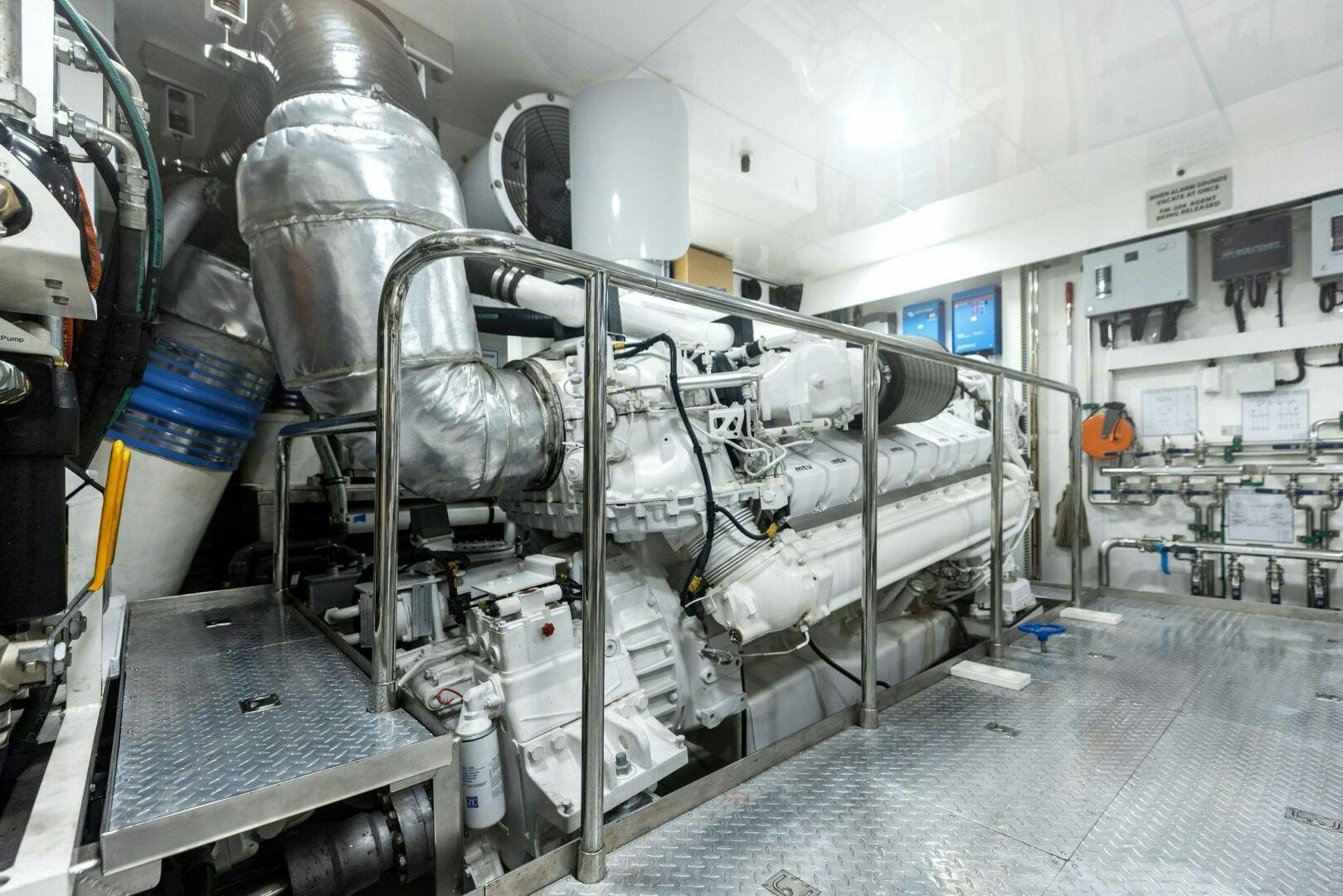 a large machine in a room aboard SUNZSET Yacht for Sale