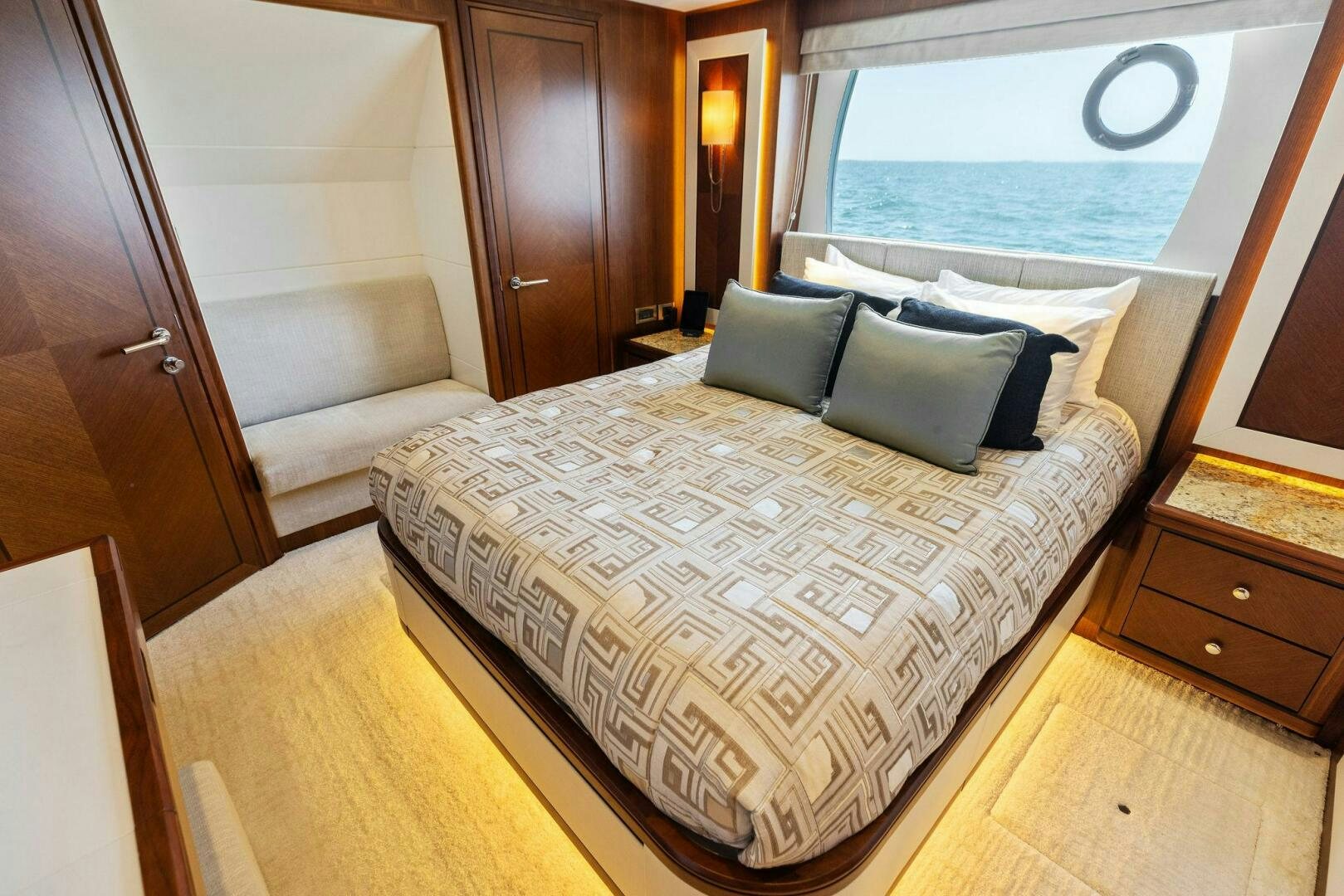 a bed with a white sheet aboard SUNZSET Yacht for Sale