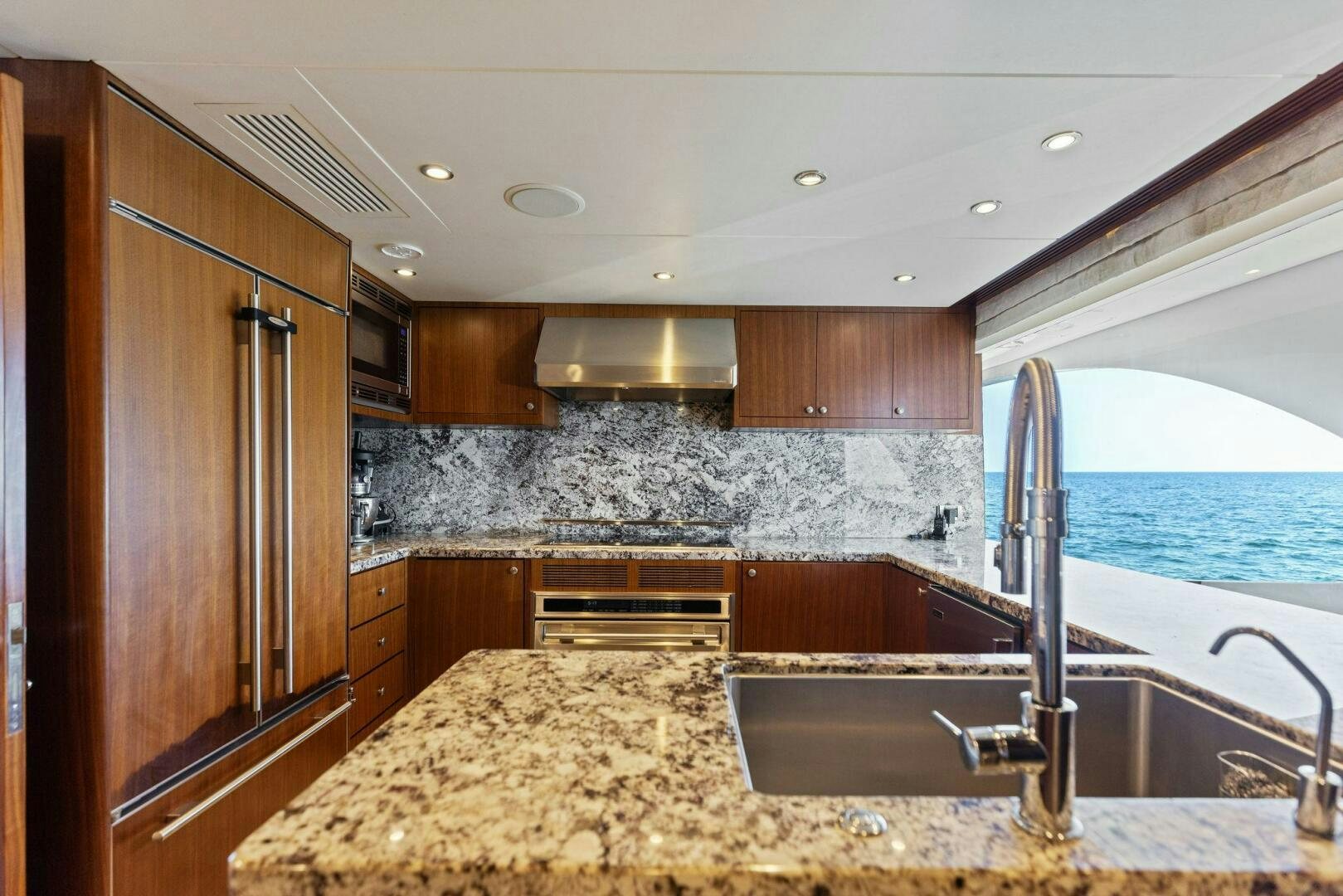 a kitchen with granite counter tops aboard SUNZSET Yacht for Sale