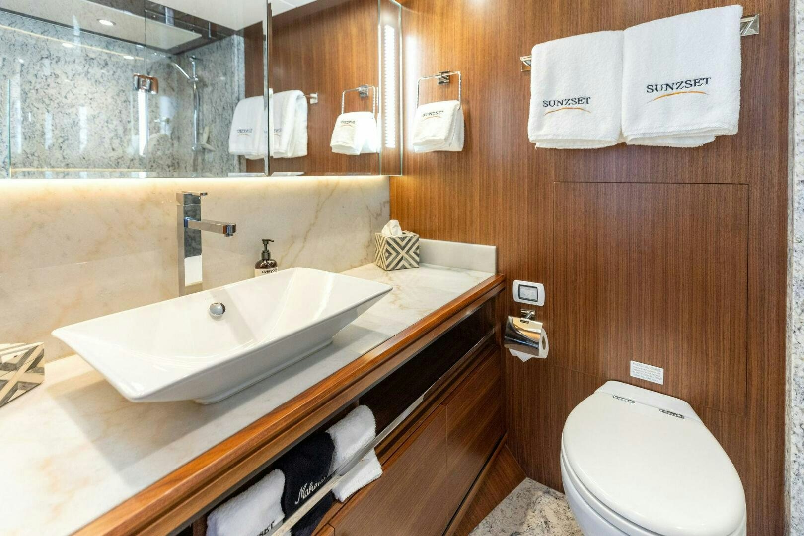 a bathroom with a sink and a toilet aboard SUNZSET Yacht for Sale