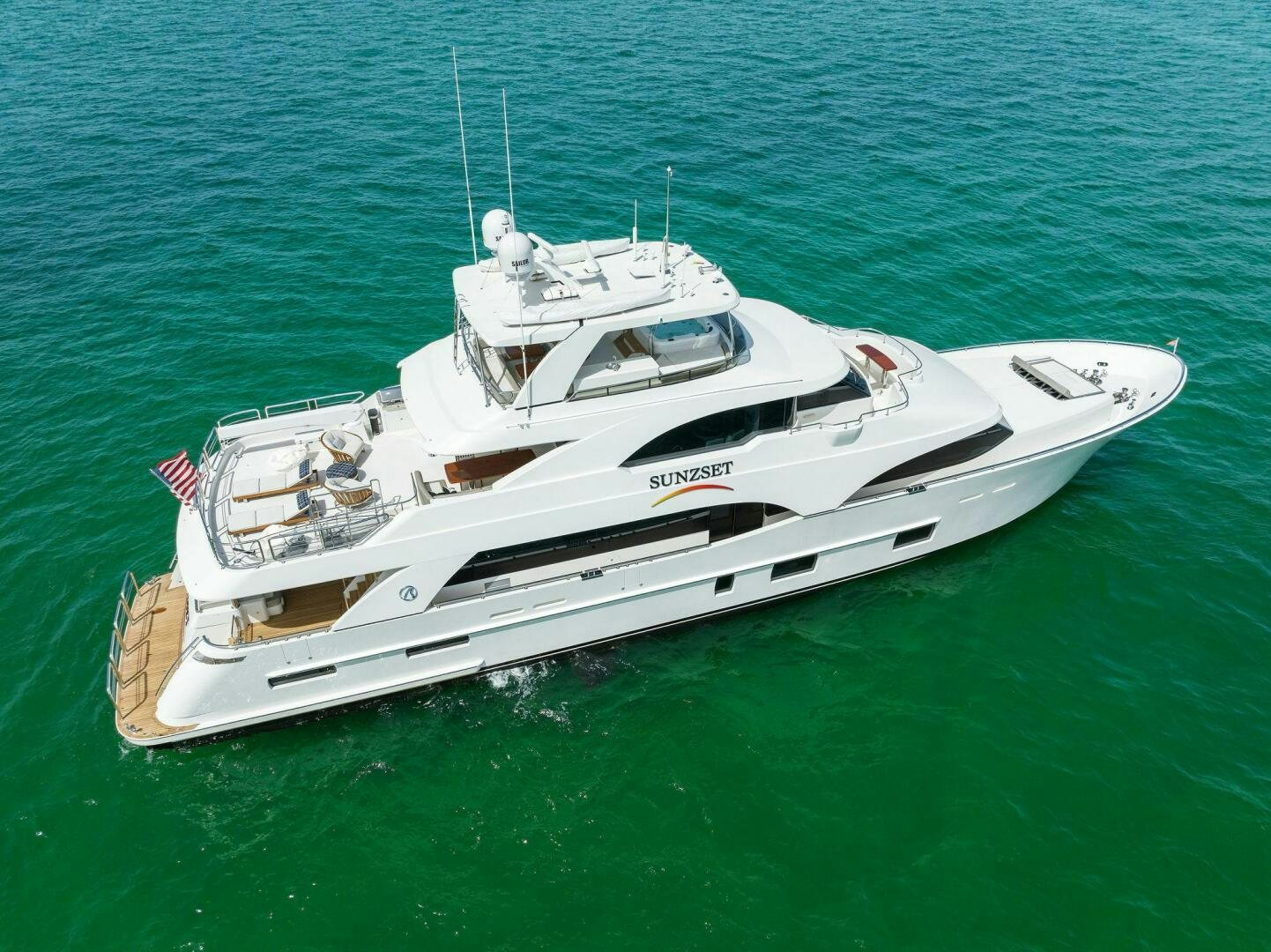 a white boat in the water aboard SUNZSET Yacht for Sale