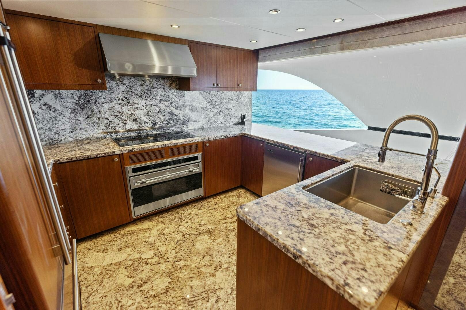 a kitchen with granite counter tops aboard SUNZSET Yacht for Sale