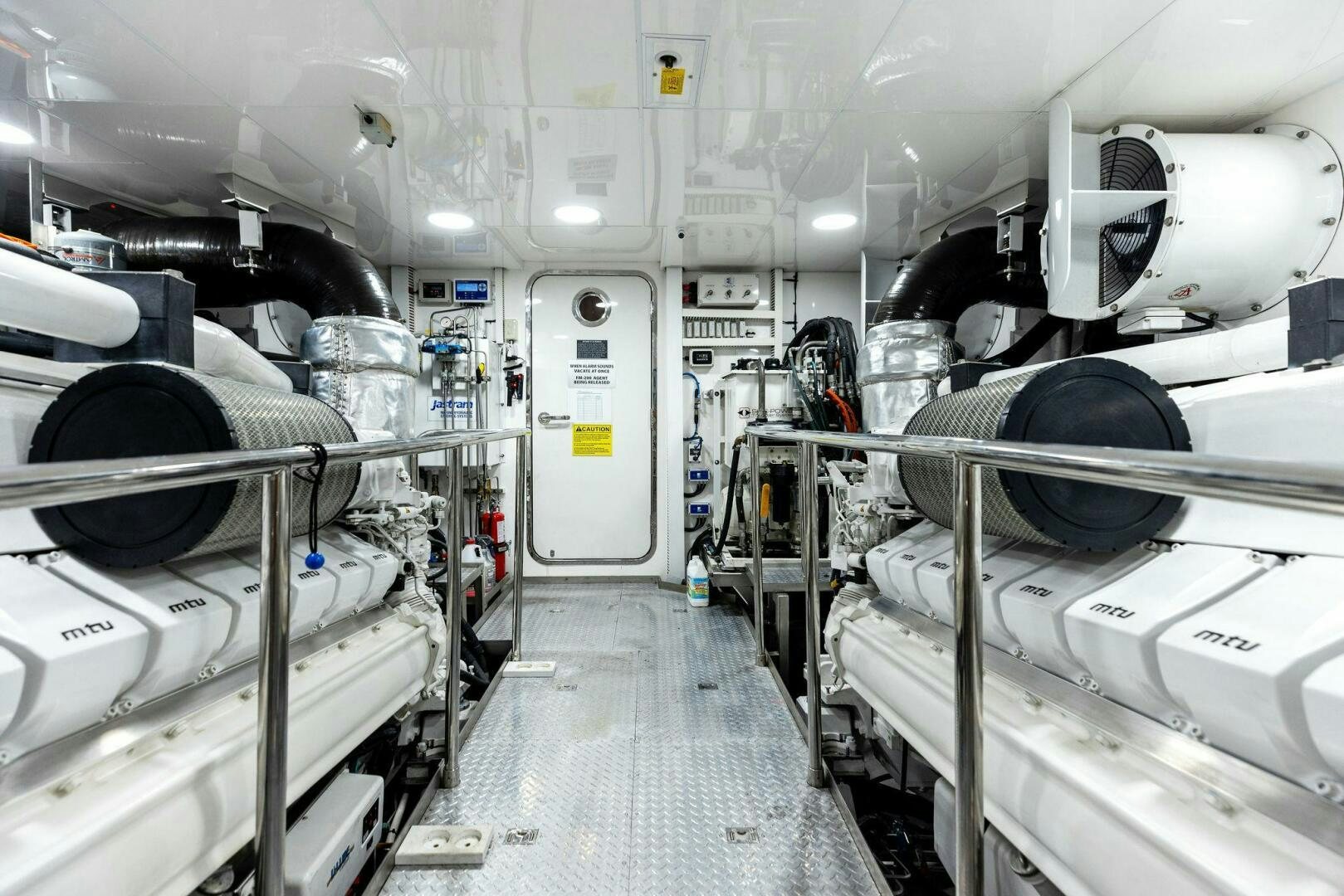 a large room with machines aboard SUNZSET Yacht for Sale