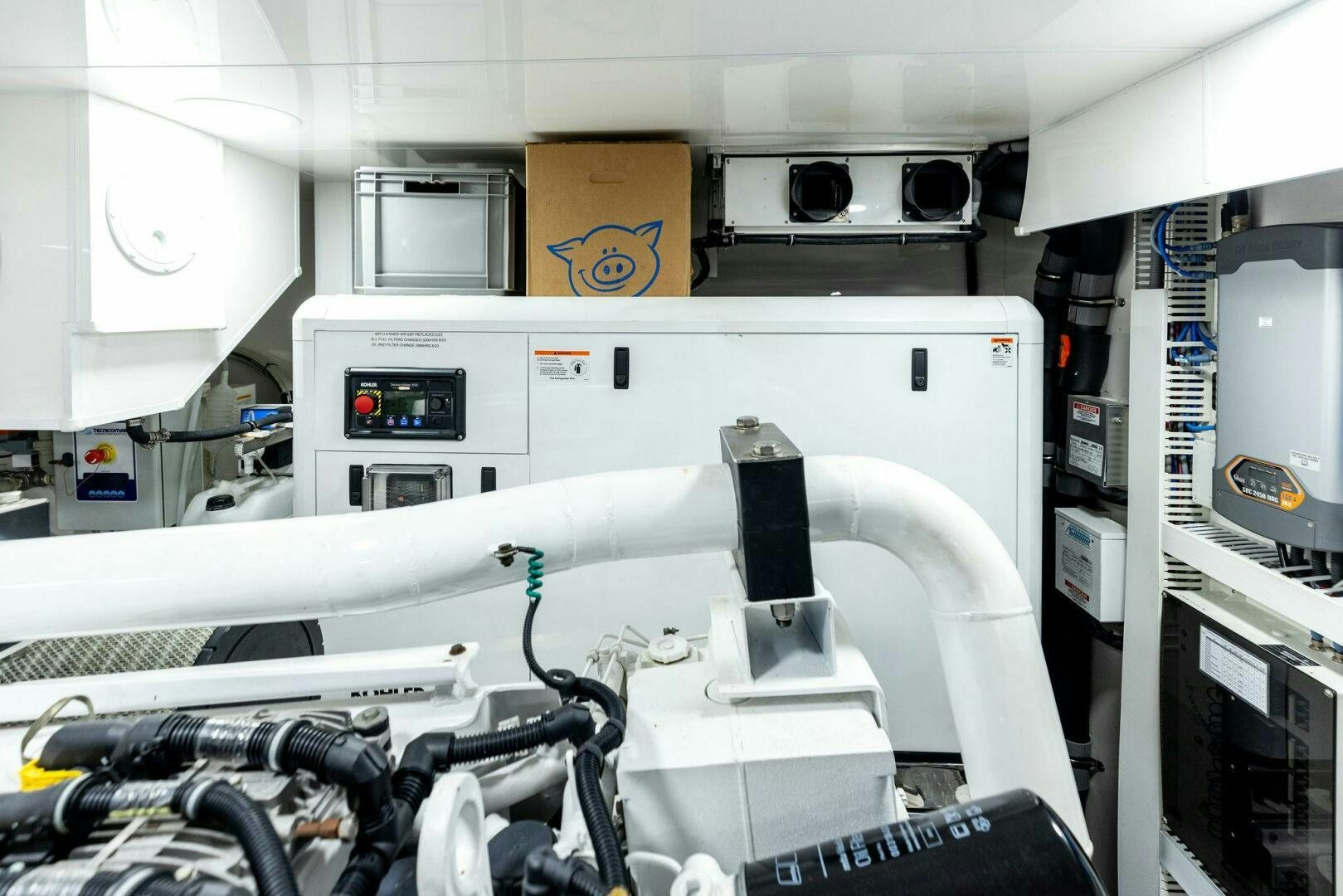 a machine in a room aboard SUNZSET Yacht for Sale