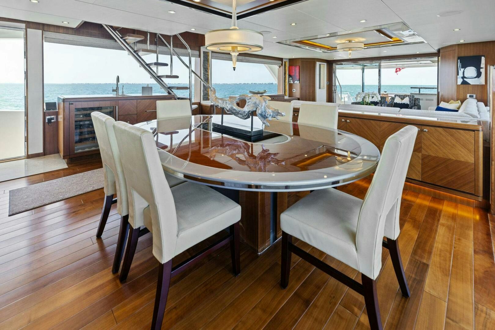 a dining room with a table aboard SUNZSET Yacht for Sale