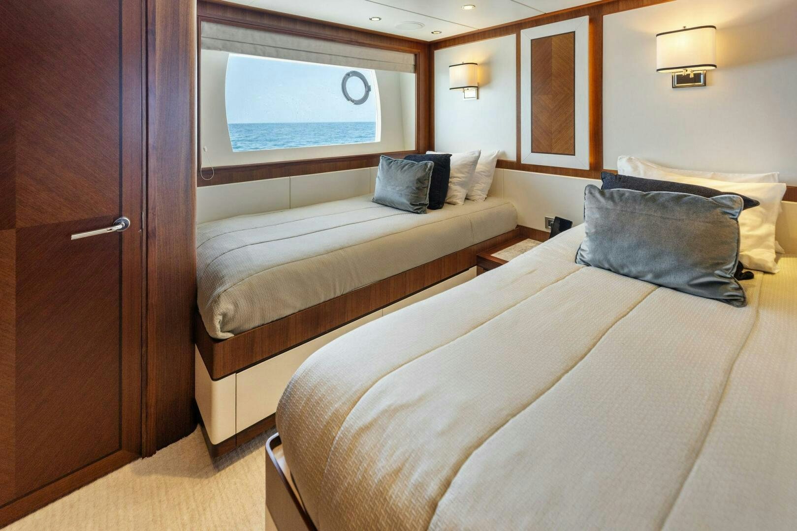 a couple of beds in a room aboard SUNZSET Yacht for Sale
