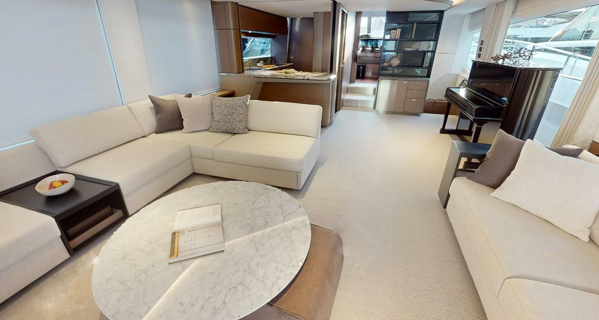 a living room with a couch and a table aboard SIDURI III Yacht for Sale
