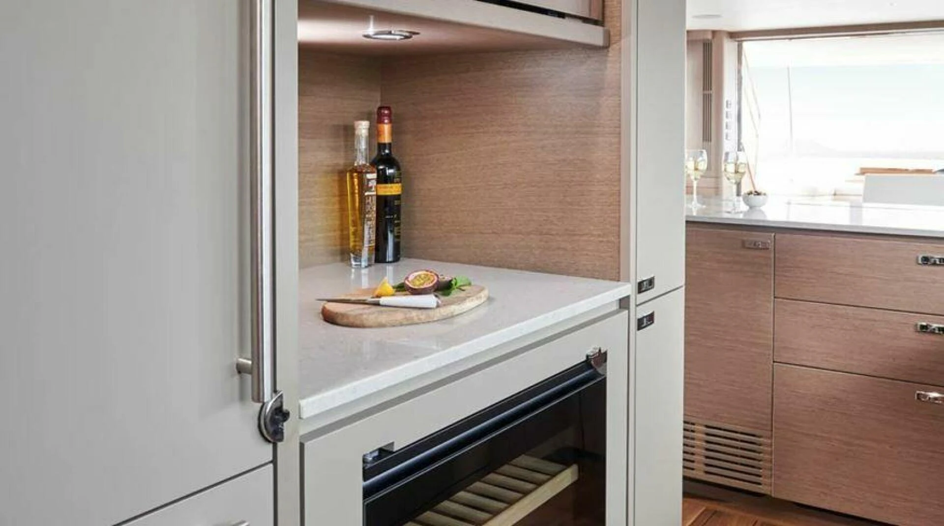 a kitchen with a large island aboard SIDURI III Yacht for Sale