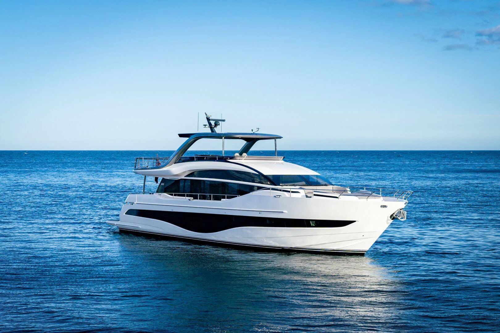 a white yacht in the water aboard SIDURI III Yacht for Sale