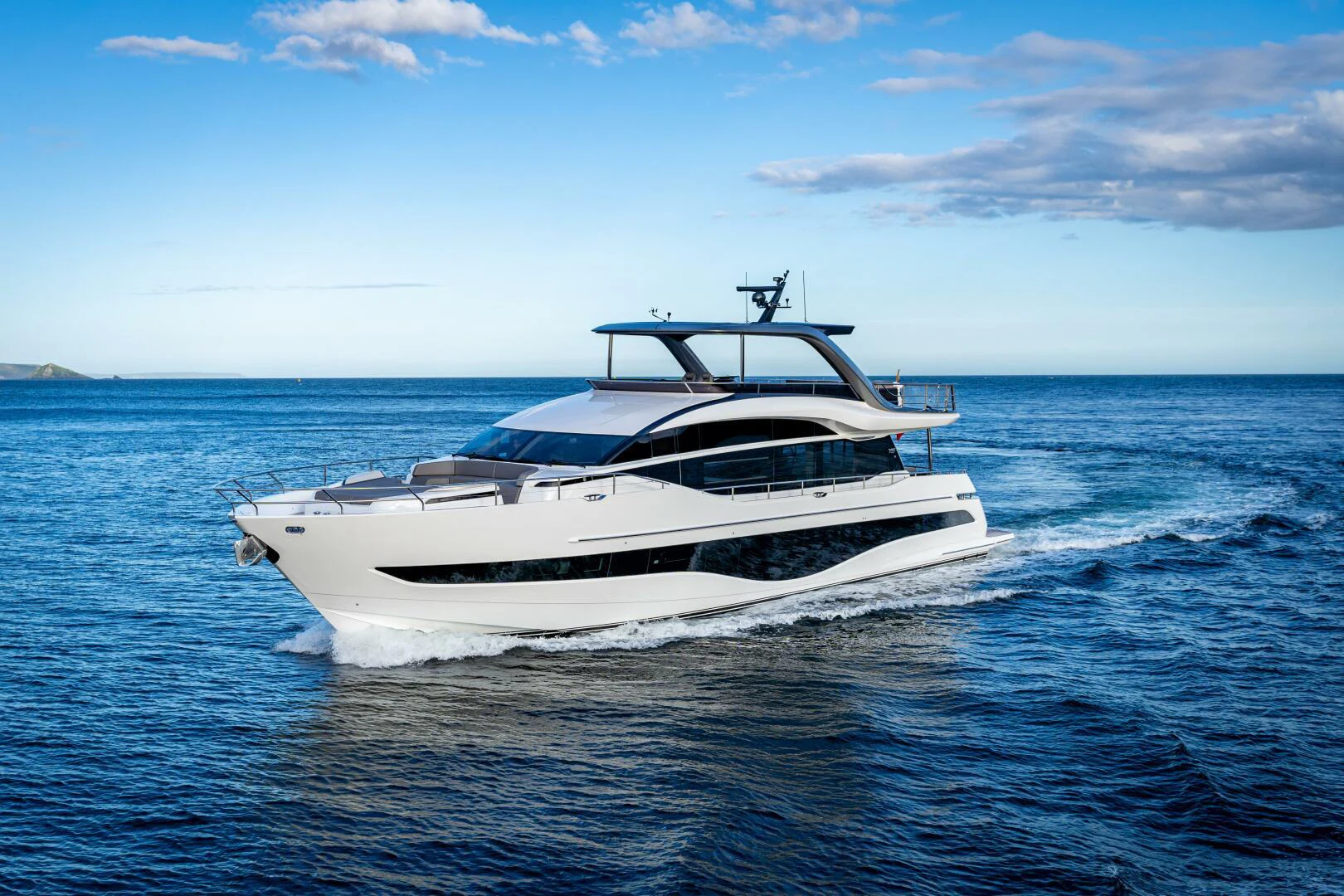 a white yacht in the water aboard SIDURI III Yacht for Sale