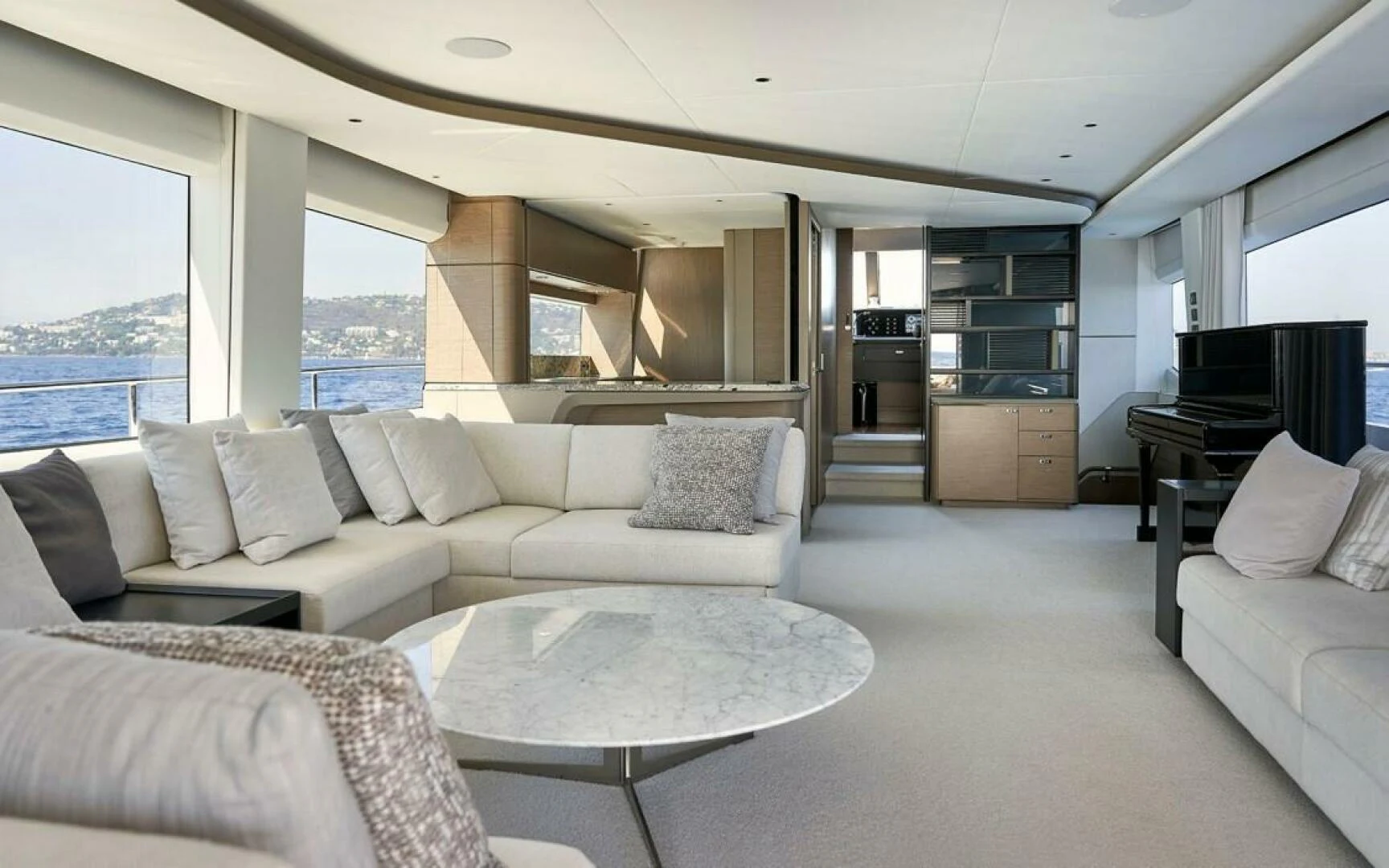a living room with a couch and a table aboard SIDURI III Yacht for Sale