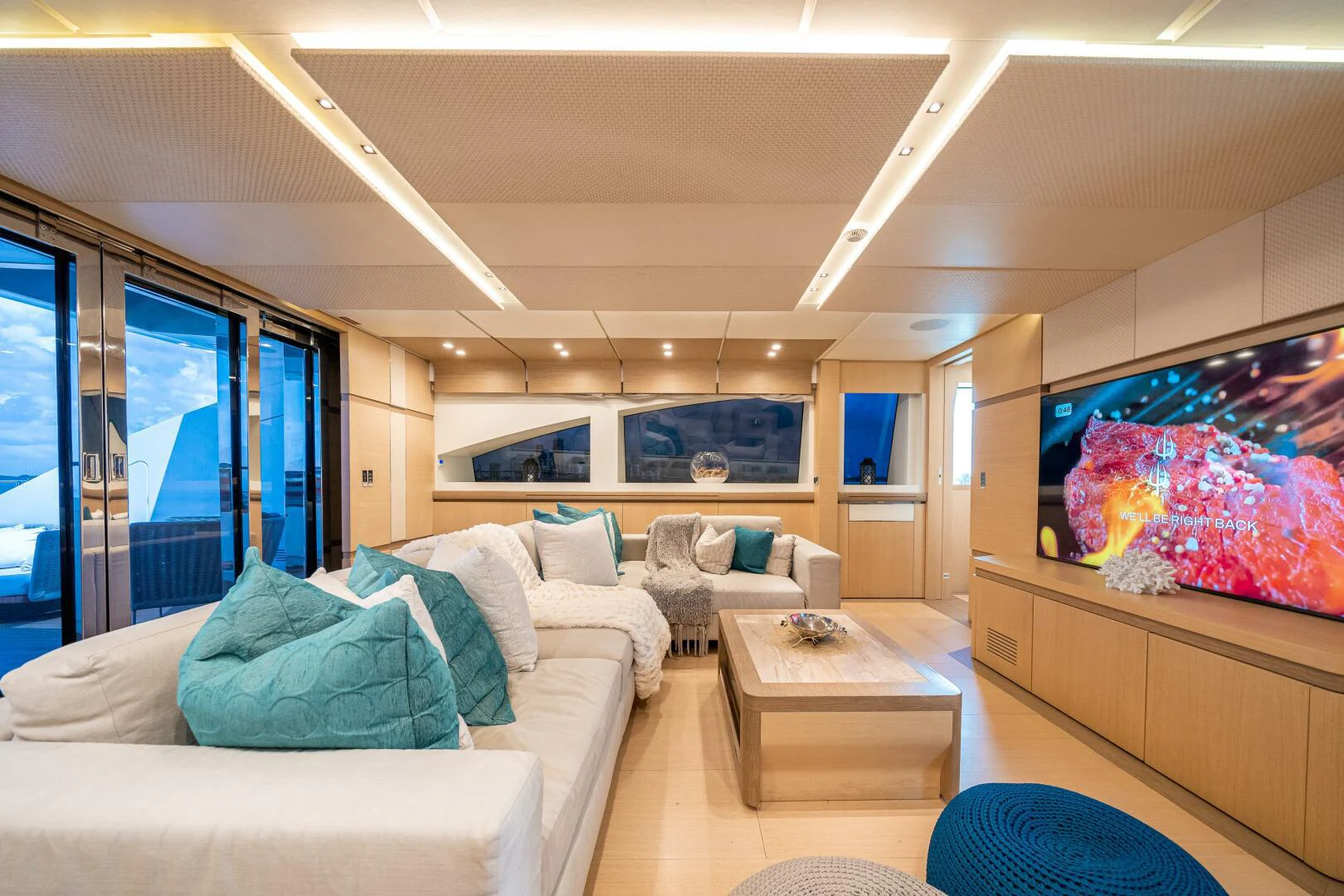 a living room with a large window aboard LEUDIN I Yacht for Sale