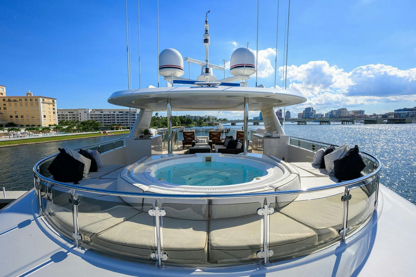 a white boat with a white canopy aboard SARABETH Yacht for Sale