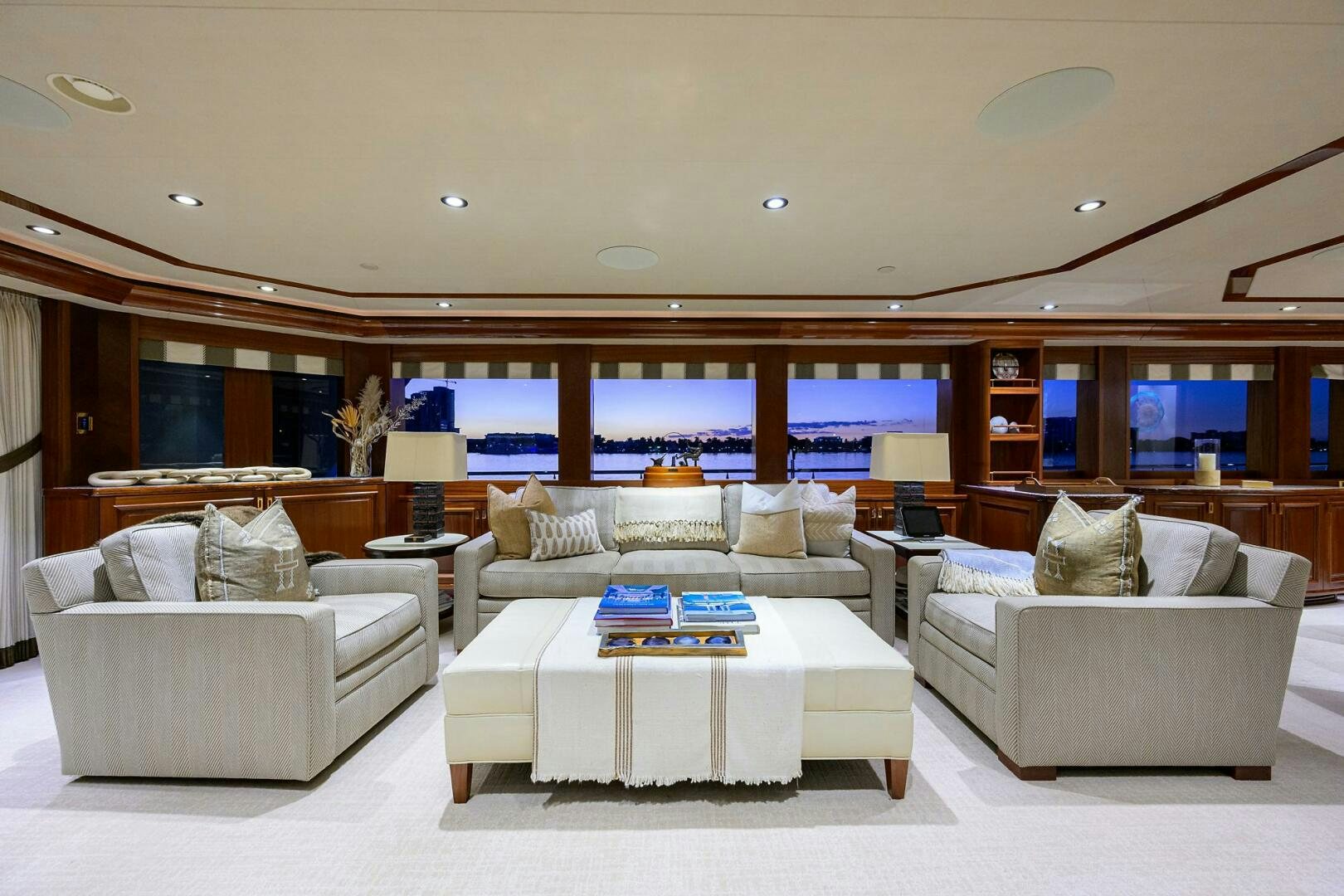 a living room with a large window aboard SARABETH Yacht for Sale
