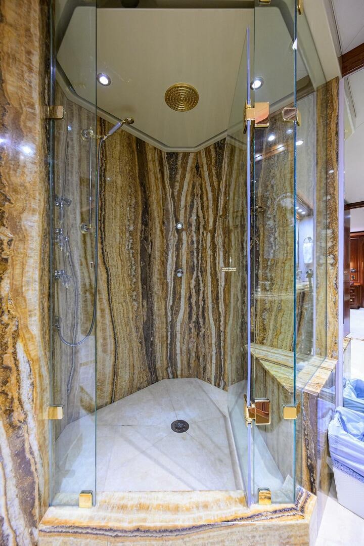 a bed in a room aboard SARABETH Yacht for Sale