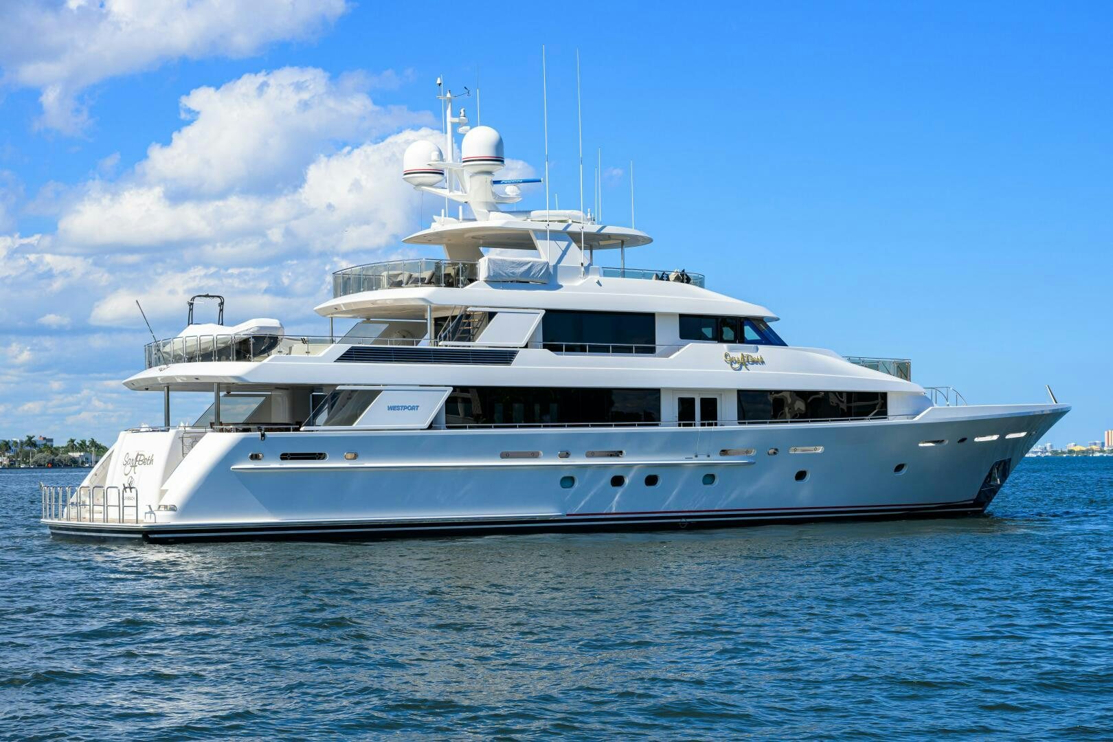 a white yacht on the water aboard SARABETH Yacht for Sale