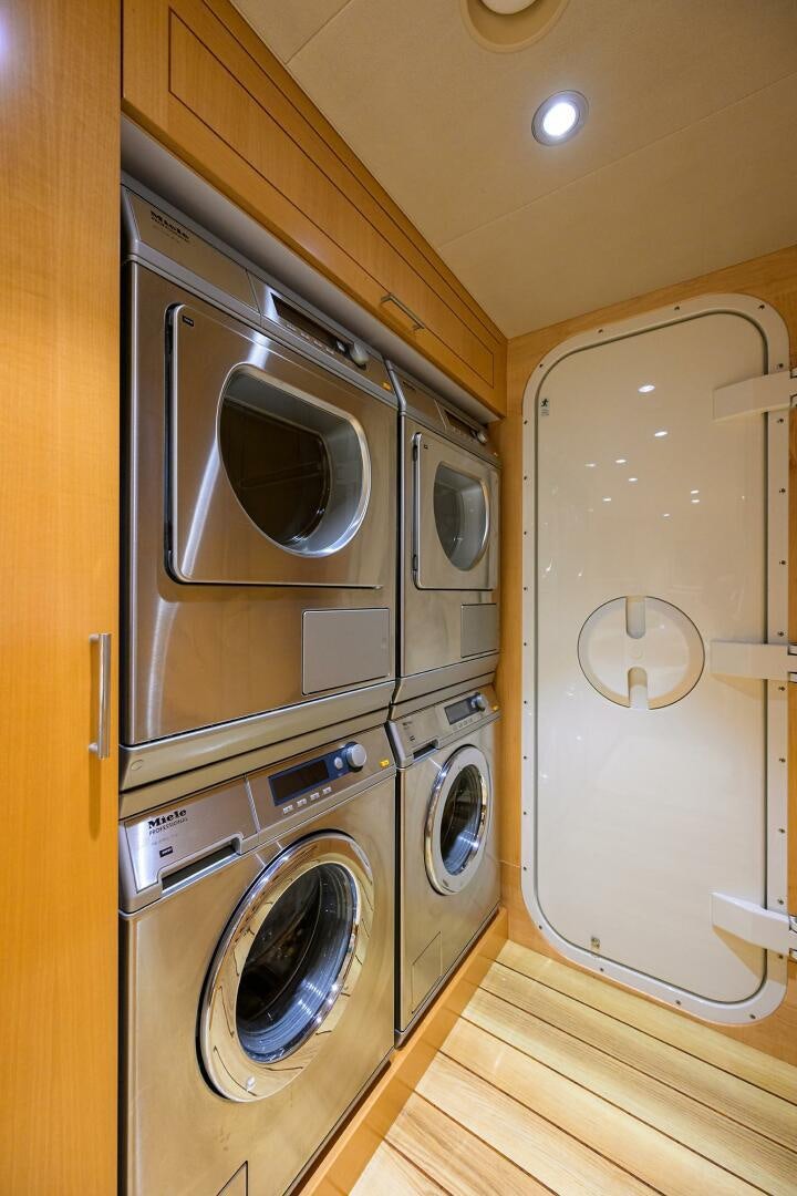 a room with washer and dryer aboard SARABETH Yacht for Sale