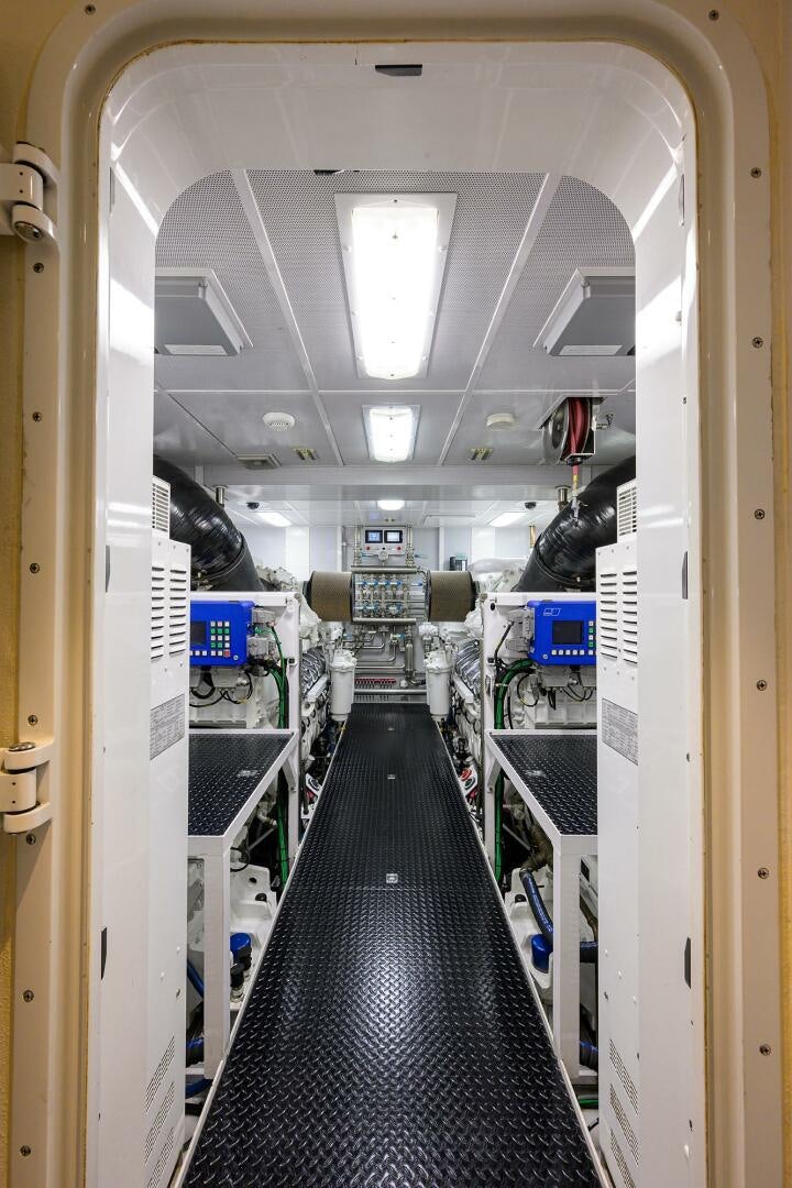 a hallway with several machines aboard SARABETH Yacht for Sale