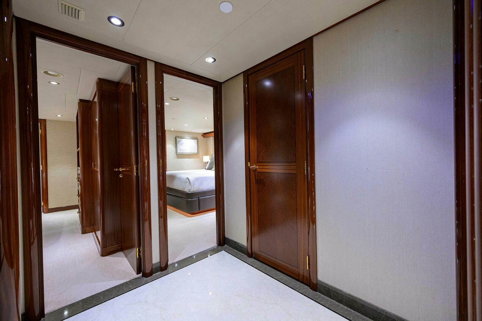 a room with a bed and a closet aboard SARABETH Yacht for Sale