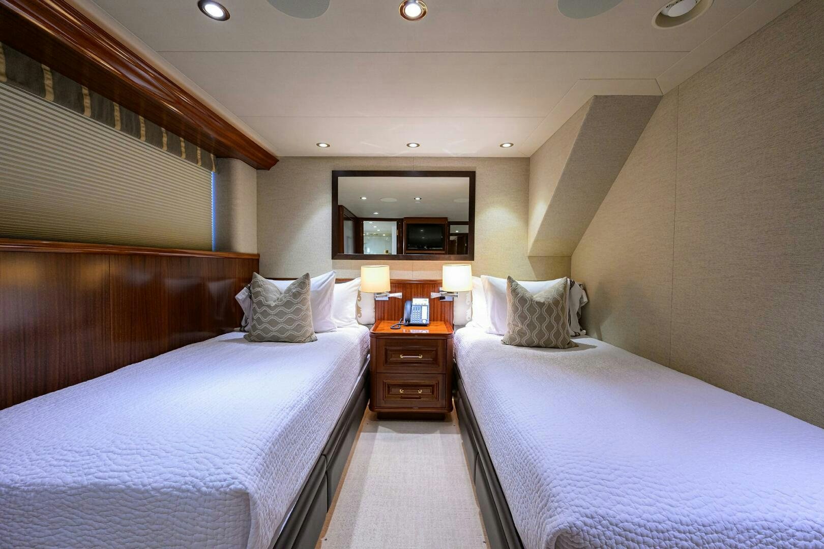a couple of beds in a hotel room aboard SARABETH Yacht for Sale