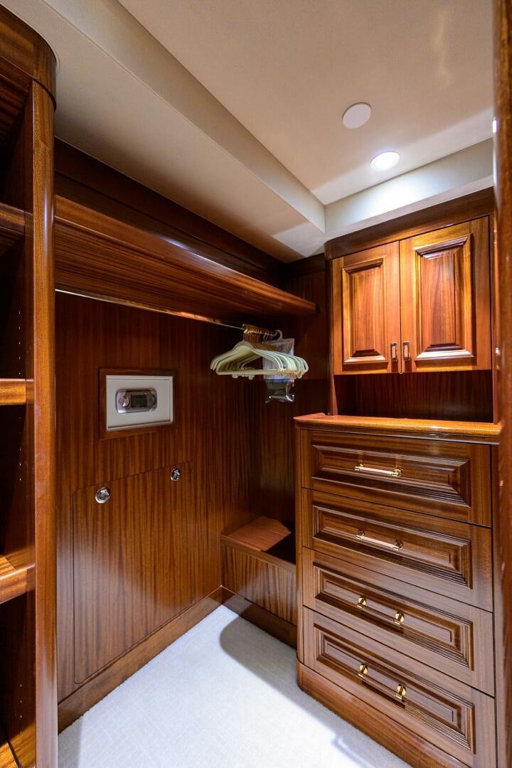 a wooden room with wooden cabinets aboard SARABETH Yacht for Sale